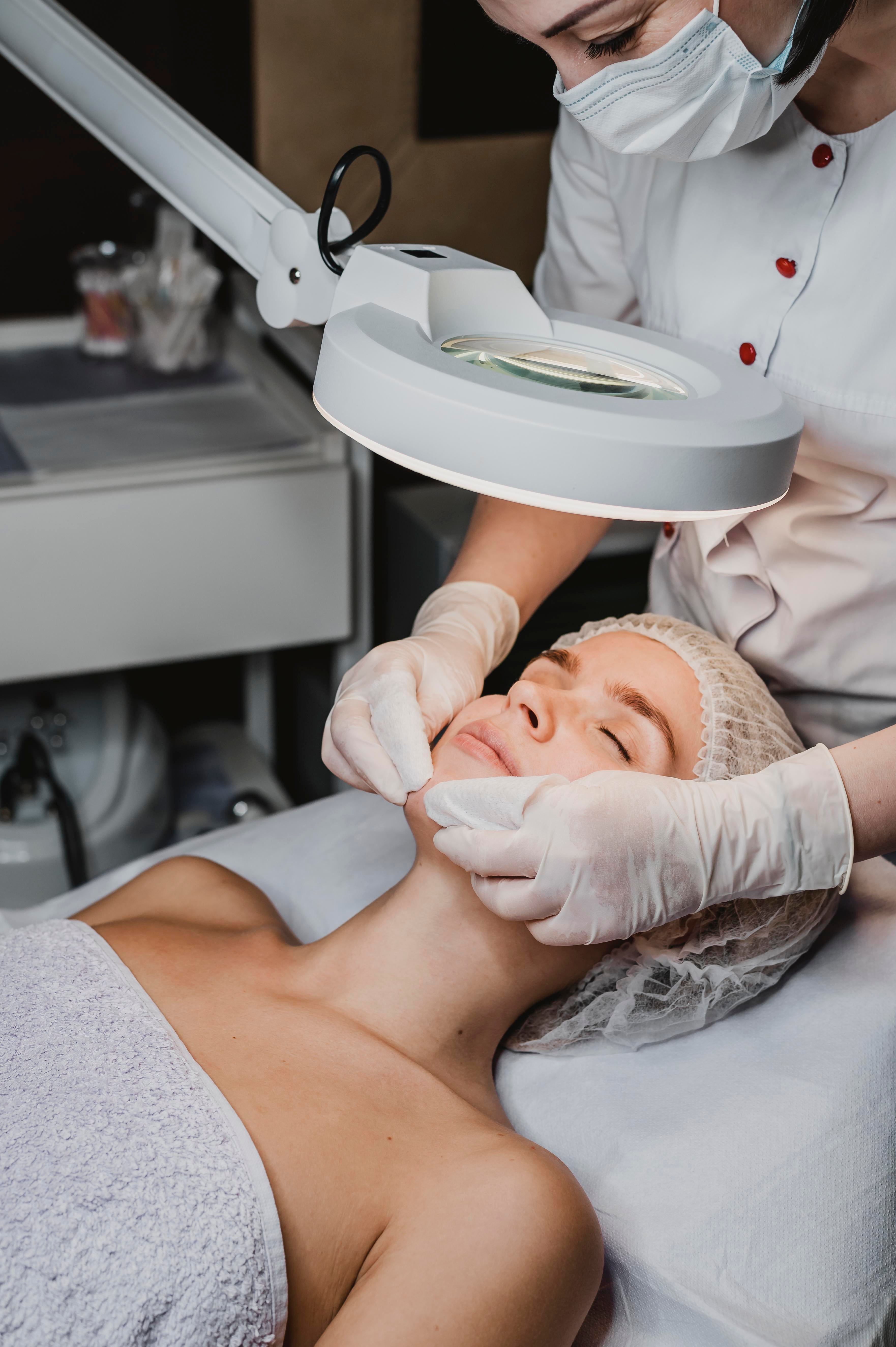 young-woman-getting-beauty-procedure-spa.